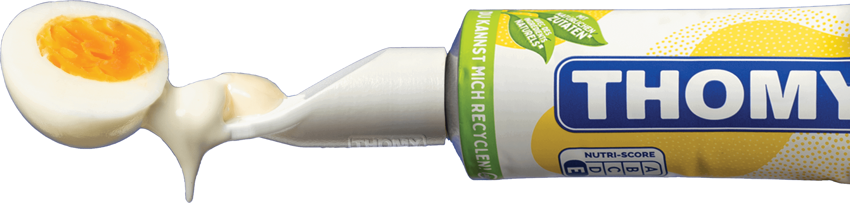 Tube of Thomy mayonnaise with a Saurk on top. Presenting an delicious half egg – yummie.