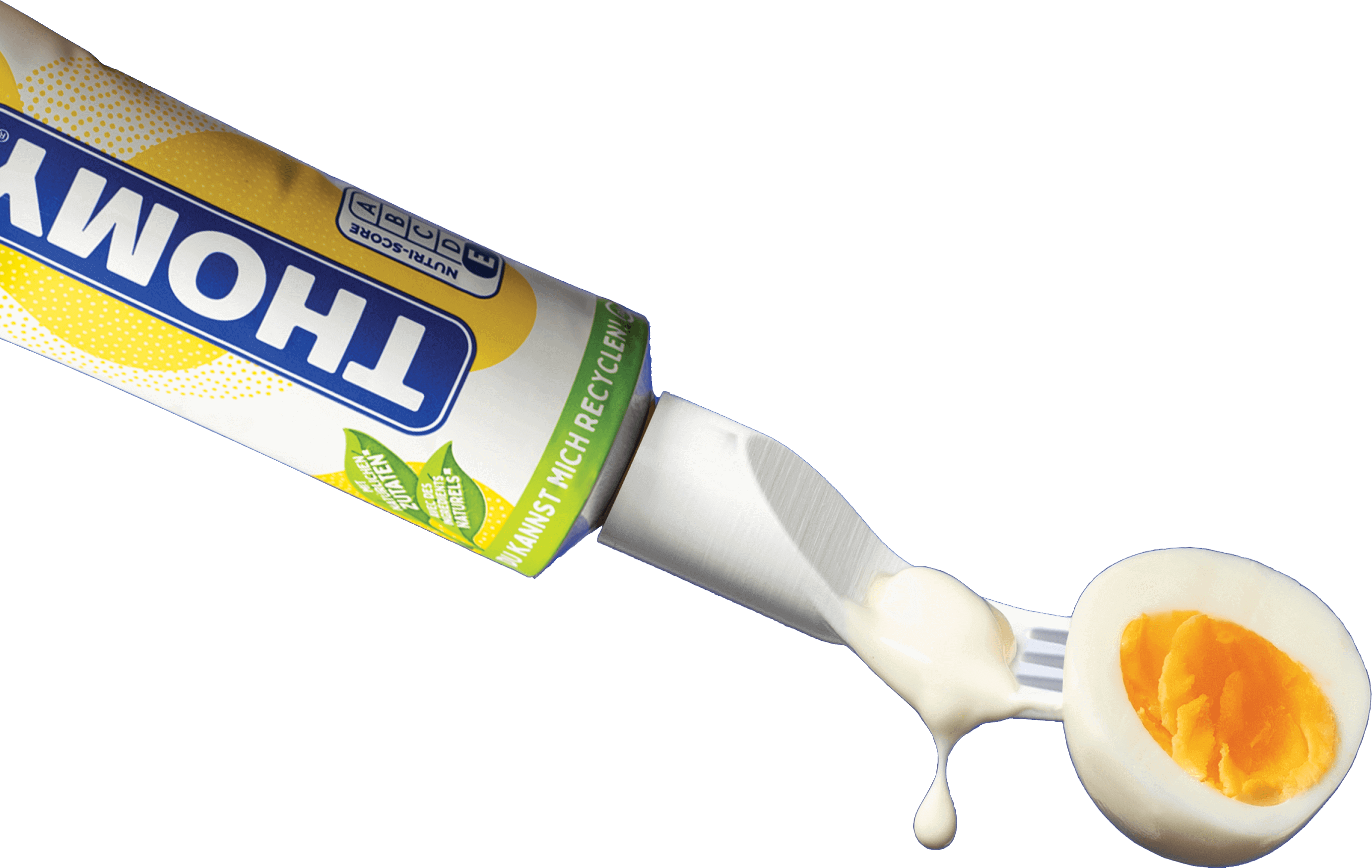 Tube of Thomy mayonnaise with a Saurk on top. Presenting an delicious half egg – yummie.